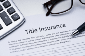 A title insurance application form. Title insurance protects homeowners and lenders against claims related to the ownership of the property. By signing this agreement, individuals confirm that the property has a clear title and that they are legally authorized to transfer it.